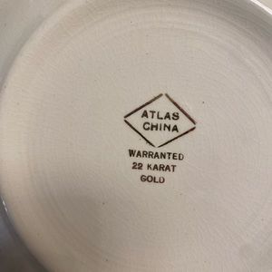 22 carat. Gold trimmed antique small plate set of 8 and a platter.